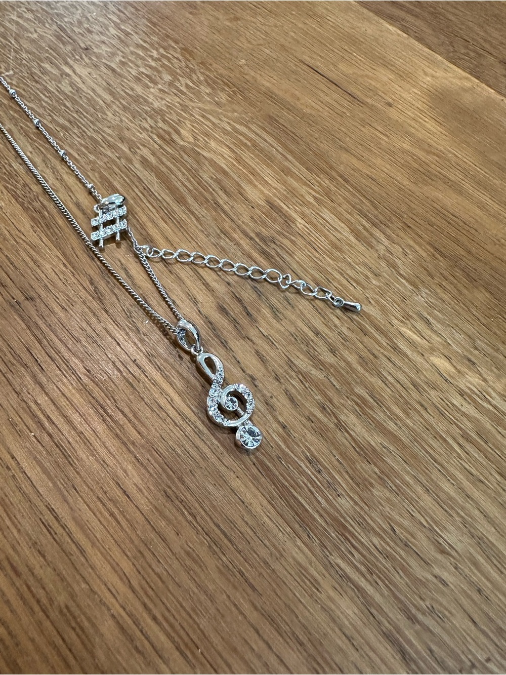 Silver Treble Clef Pendant Necklace with Crystal Accent